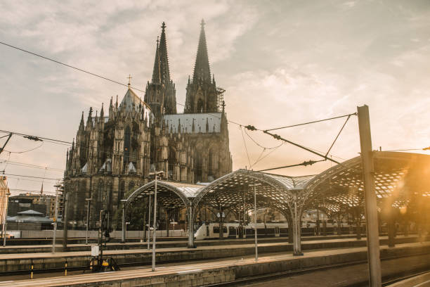 istock Cologne Cathedral and railroad station at sunset 997091326