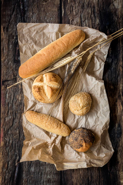 istock Assortment of fresh and golden breads. 997095762
