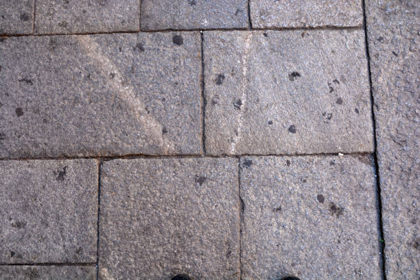 istock texture of a floor with chewing gums 997100716