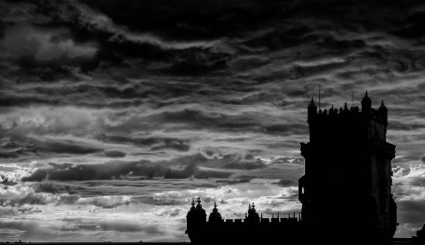 istock Panoramic view of Atlantic Ocean with ancient Belem Tower at sunset  (Black and White) 997105294