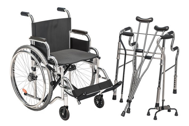 Wheelchair, walking frame and crutches isolated on white background