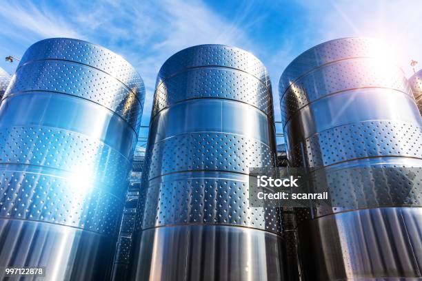 Stainless Steel Storage Tank Containers At The Chemical Plant Factory Stock Photo - Download Image Now