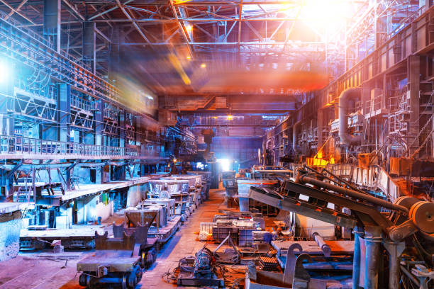 Interior of metallurgical plant workshop Interior of metallurgical plant industrial workshop with open hearth furnace and heavy industry manufacturing equipment metal industry stock pictures, royalty-free photos & images