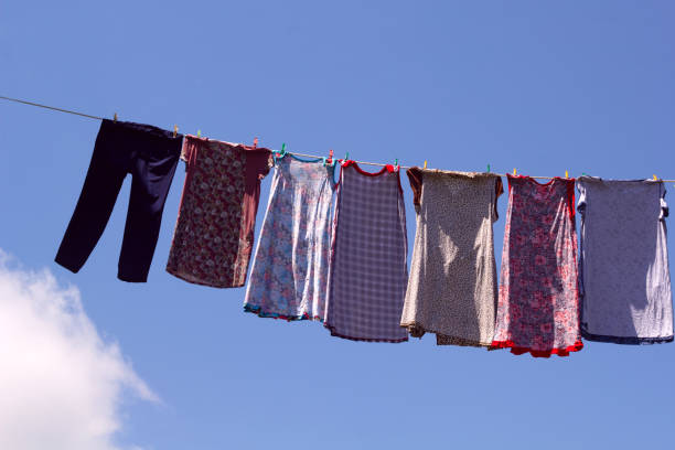 istock dresses and pants hanging on a rope outside 997136126