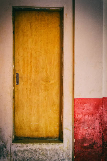 istock Wood door with giant step. 997137394