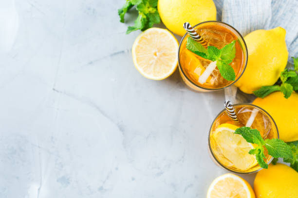 istock Lemon mint iced tea cocktail refreshing drink for summer days 997166000