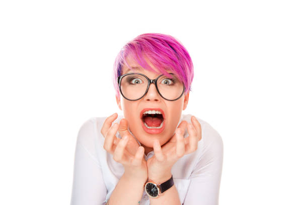 istock Thrilled young woman screaming at camera 997180832