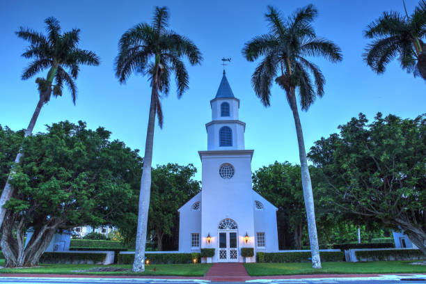 Naples, Florida, USA - June 29, 2018: Night over Trinity by the Cove Episcopal Church in the Port Royal part of Naples, Florida. Editorial use.