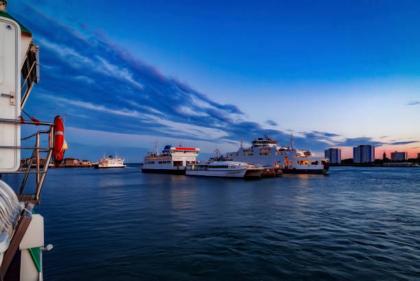Portsmouth Harbour captured at twilight with ferry boats moored up for the day