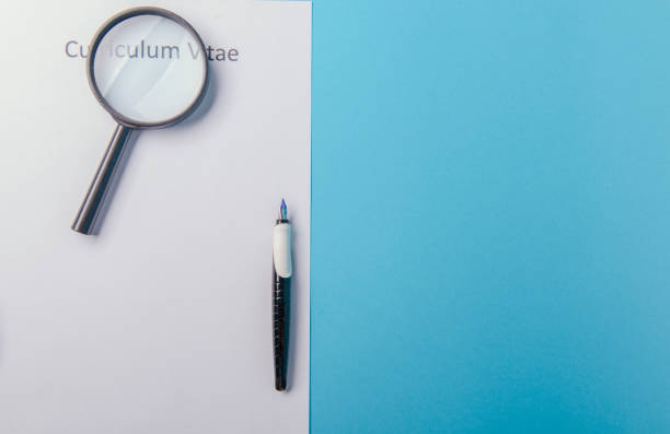 istock Curriculum vitae written on an blank white paper 997210212