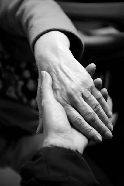 istock Hands of elderly woman with alzheimer doing massage 997271348