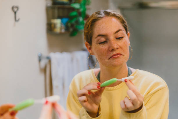 istock Woman Holding Tampon 997275306