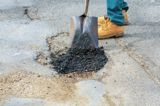istock Street resurfacing. Fresh asphalt construction. Bad road 997282898