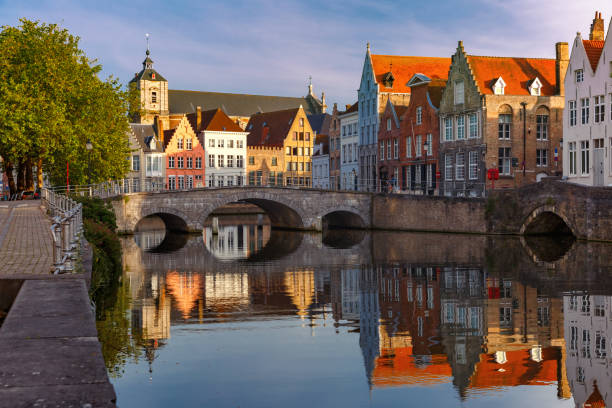 istock Night Bruges canal and bridge, Belgium 997286122