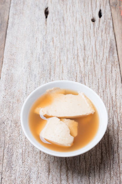 istock Bean junket eaten hot with gingered syrup, Soy custard 997289500
