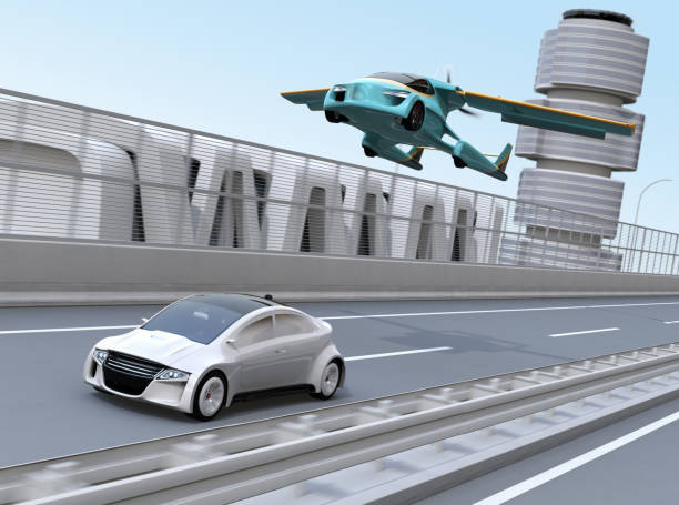 istock Futuristic flying car flying over a silver sedan driving on highway 997294600