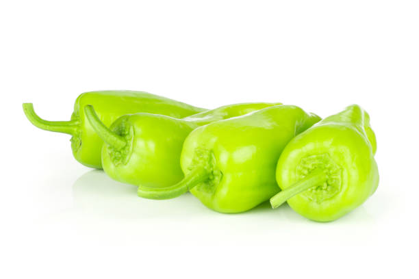 istock Fresh raw light green pepper isolated on white 997295220