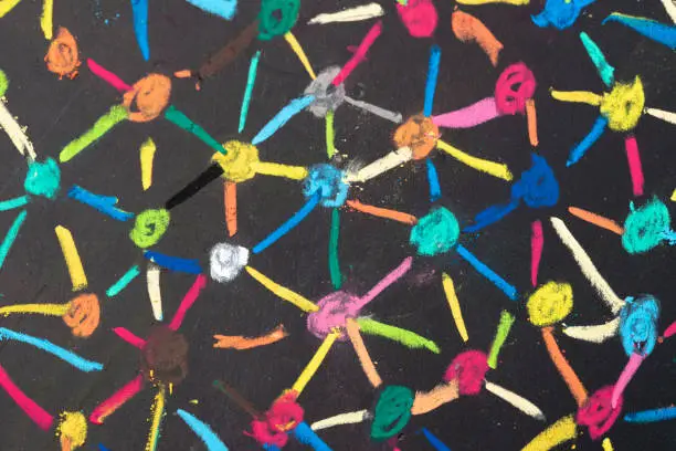 Photo of Decentralize, bond or social network concept, macro view of colorful pastel link and connect chalk line between multiple dot or peers on blackboard