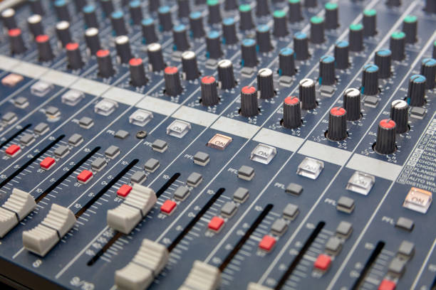istock Closeup of the professional audio mixing console. Selective focus. 997322850