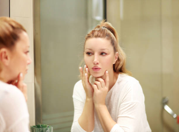 istock Magic anti-aging cream.Applying the cream 997324622