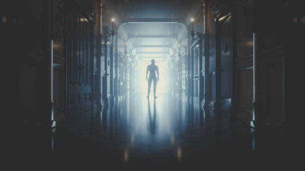 istock Mysterious man at the end of the hall 997329226