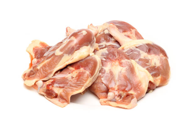 istock Raw duck legs isolated on white background 997341414