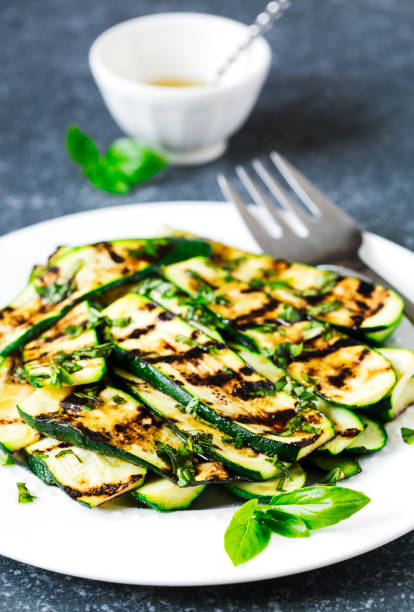istock Grilled zucchini with basil and olive oil 997351194