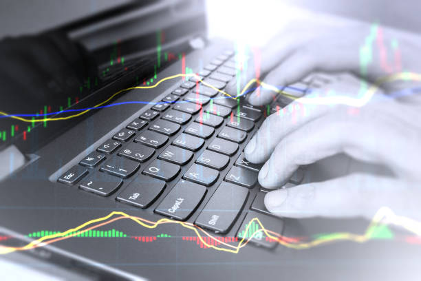 istock Technical analysis by online traders risking money gambling by day-trading. 997354148