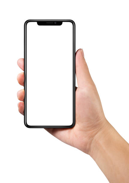 istock Man hand holding the black smartphone with blank screen and modern frame less design isolated on white 997373266