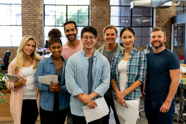 istock Multi-ethnic group of people working at a creative office 997374148