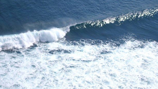 istock Aerial drone view of foaming waves in ocean 997377778