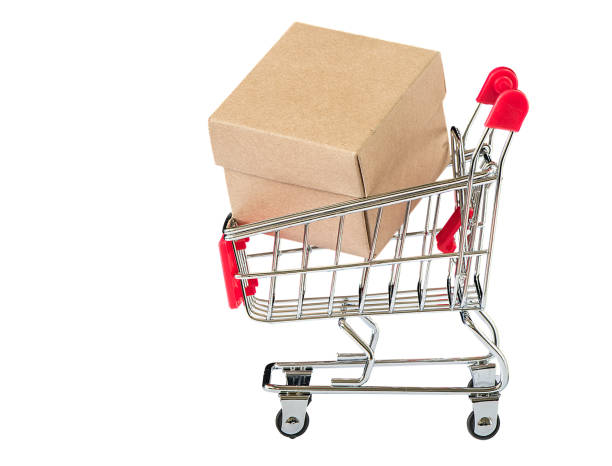 istock Shopping cart with paper box isolated on white background 997390254
