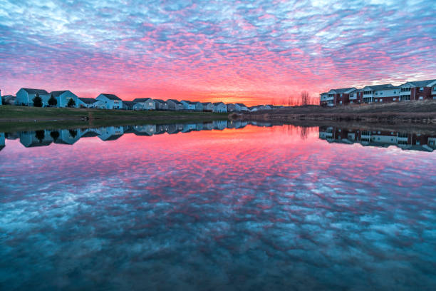 Dramatic sunset over a pond south of Indianapolis during the winter season.