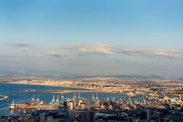 istock Aerial view industrial cargo port with ships and cranes 997424626