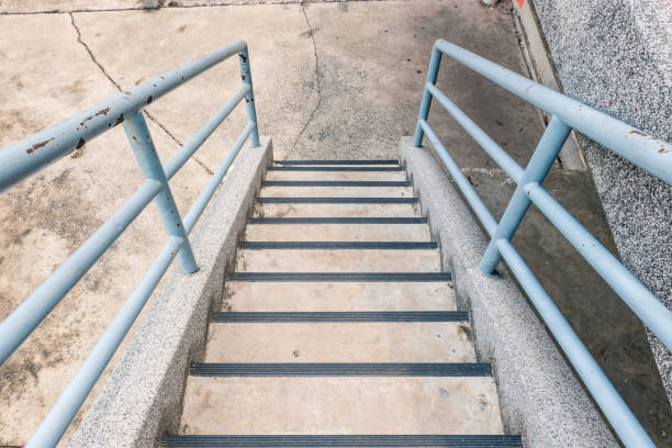 istock concrete stair with metal railing 997428492