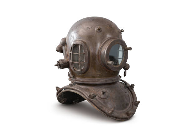 Old antique deep sea diving metal helmet isolated on white background with clipping path
