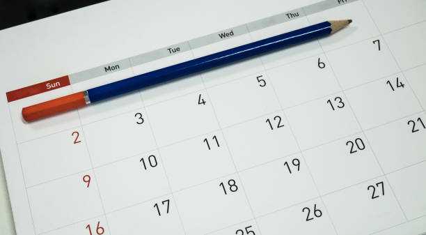 istock Calendar  with hand holding in planning concept. 997458086