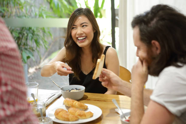 istock Diverse group of multicultural friends at home 997458146