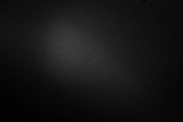 istock black paper texture or background with spotlight, dark wall backdrop wallpaper, dark tone. 997463570