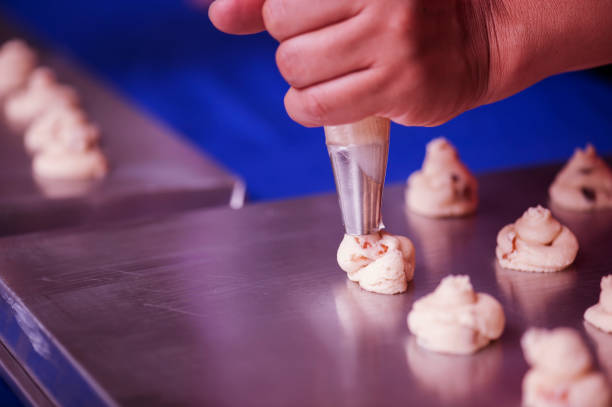 istock Making cookies, baking cookies by hand. 997479114