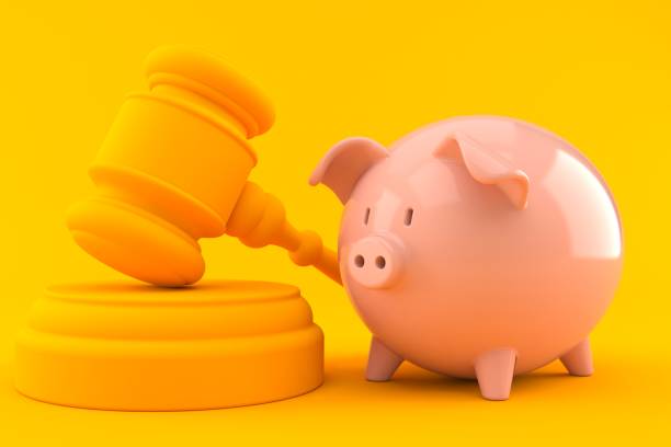 istock Law background with piggy bank 997499506