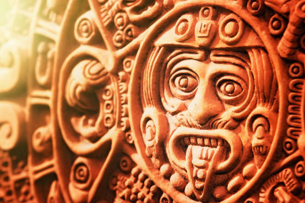 Ancient Aztec Stone of the Sun A modern ceramic reproduction of the ancient calendar known as the Stone of the Sun, carved by Aztecs in the 1500s. tonatiuh stock pictures, royalty-free photos & images