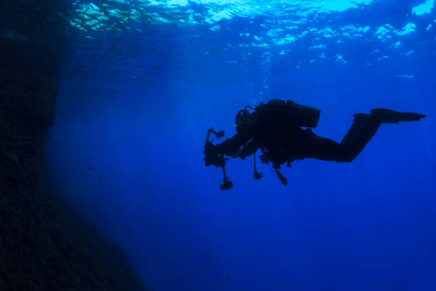 istock Underwater, underwater photographer Technical Diving Scuba diver Exploring and enjoying   Sea life  Water sports  Techdive Scuba diver point of view 997504424
