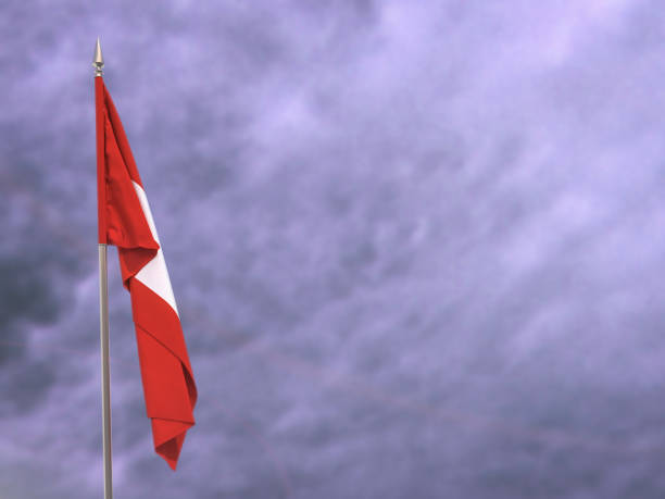 istock Flag of Switzerland hanging down dangling 997505298