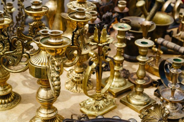 istock Selective focus on vintage retro golden candlesticks without can 997509586
