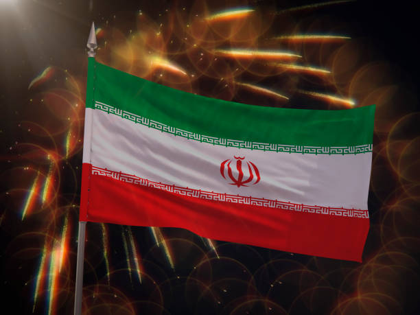 istock Flag of Iran with fireworks display in the background 997513190