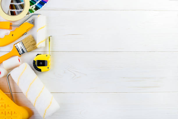 istock Mock up of color samples catalog, brush, roulette and paint roll 997513340