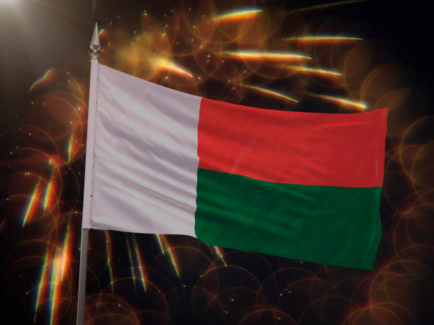 istock Flag of Madagascar with fireworks display in the background 997513904