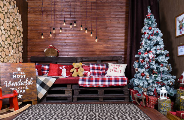 istock Beautiful Christmas interior design. Room decorated with wooden 997514200