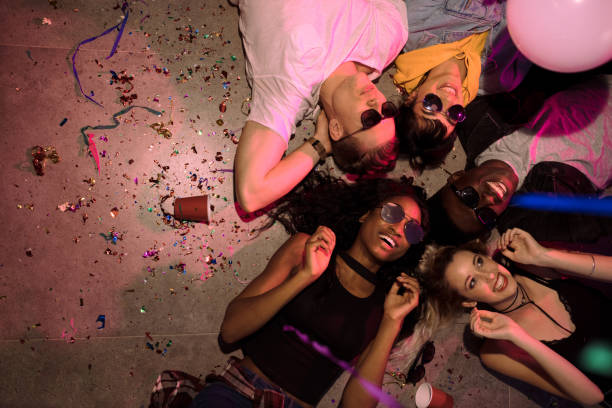 istock Friends at a house party 997514646